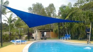 Shade sail over pool